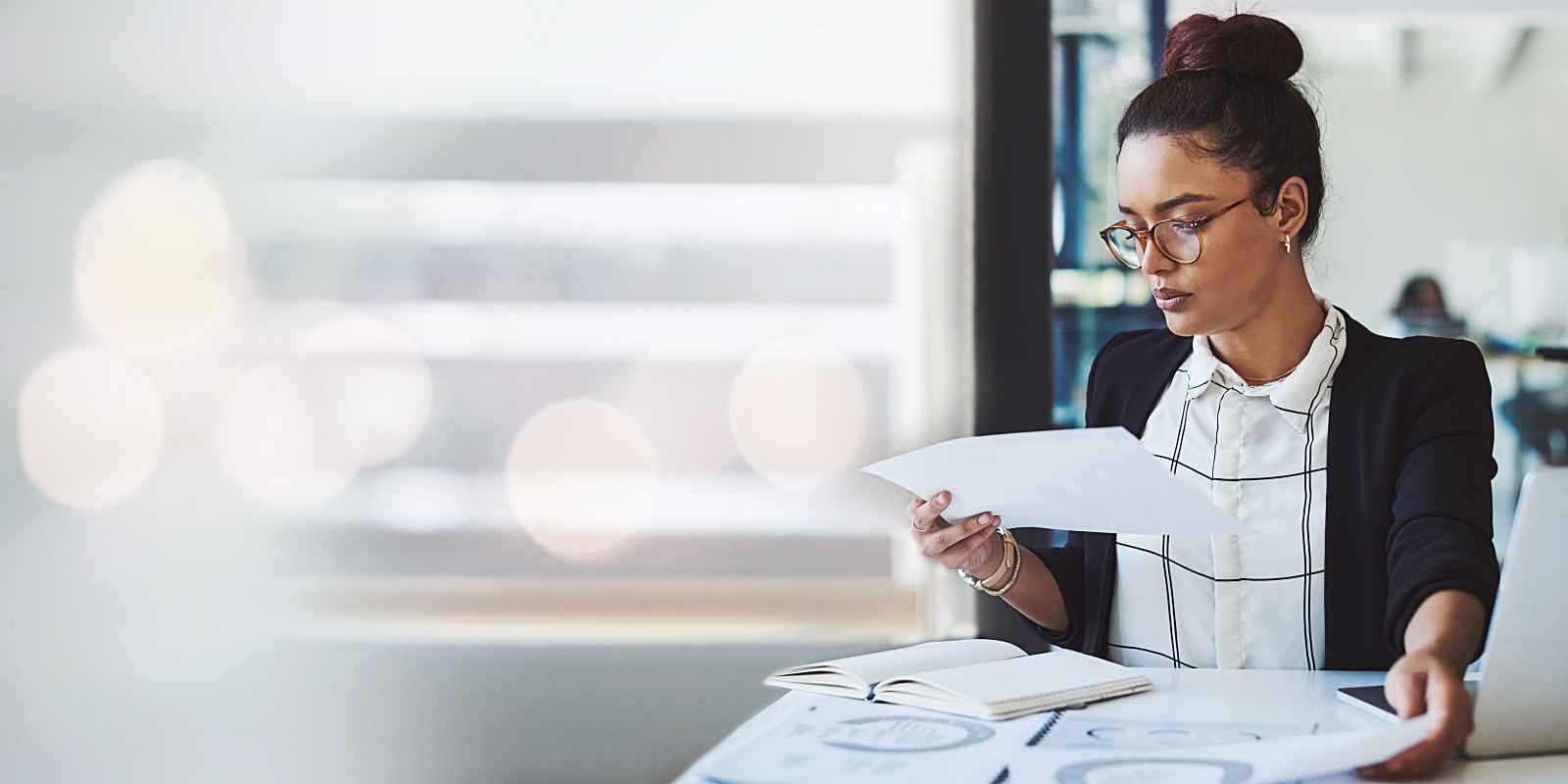 women reviewing insurance documents