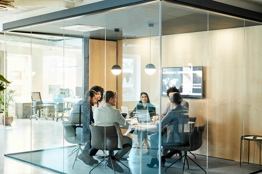 Brown-and-Brown_Business-Colleagues-Discussing-Strategy-At-Office